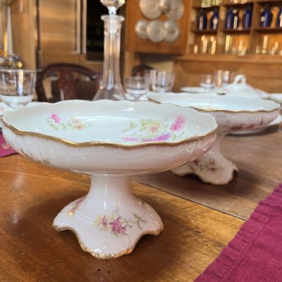 Vintage table set with pink flowers and gold edge