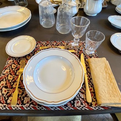 Vintage table set with scallopped shape and gold line