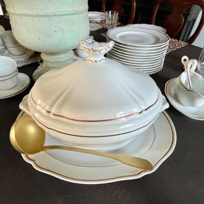 Vintage table set with scallopped shape and gold line