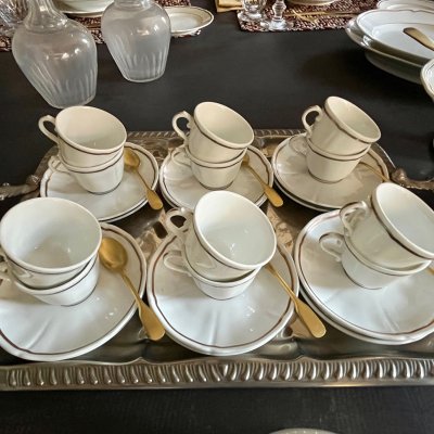 Vintage table set with scallopped shape and gold line