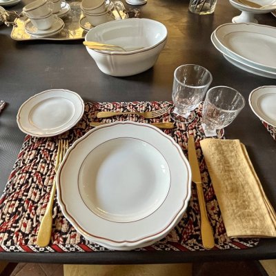 Vintage table set with scallopped shape and gold line