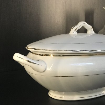 Vintage tureen with gold lines and edges