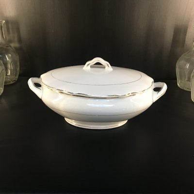 Vintage tureen with gold lines and edges