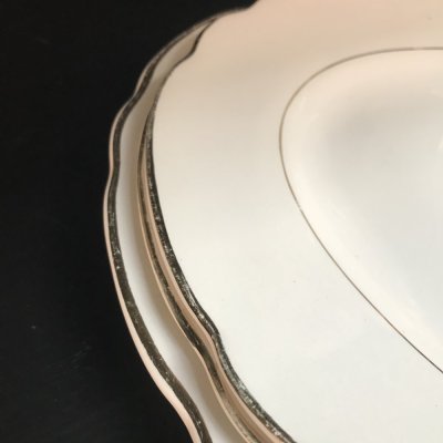 Vintage set of oval serving platters with gold edges