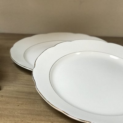 Couple of vintage round platters with gold lines