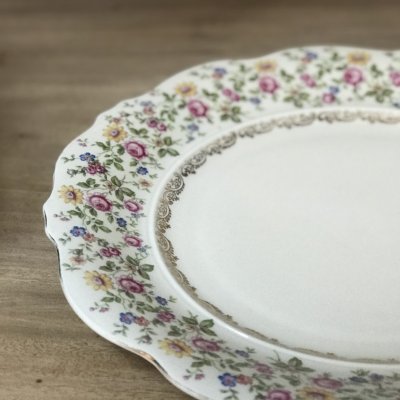 Round vintage platter with floral edge