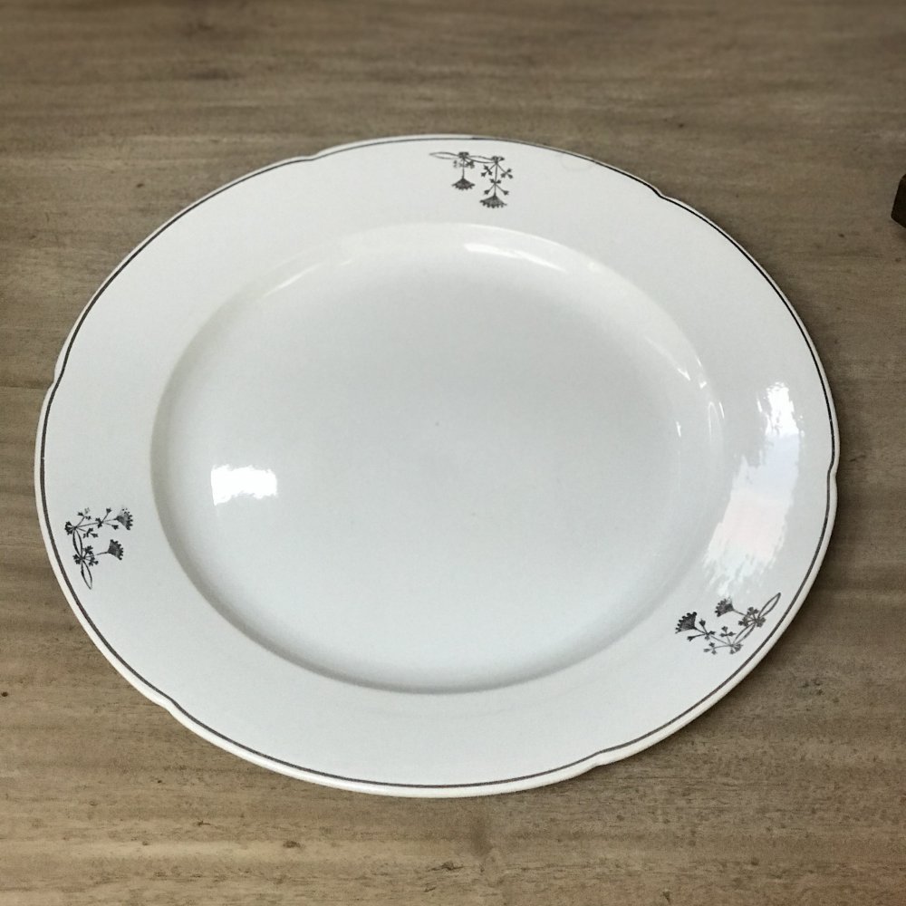 Round vintage platter with siver decorations