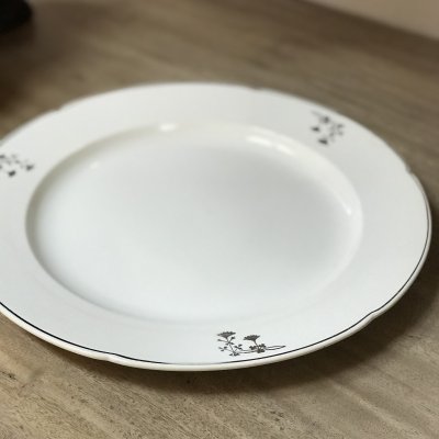 Round vintage platter with siver decorations