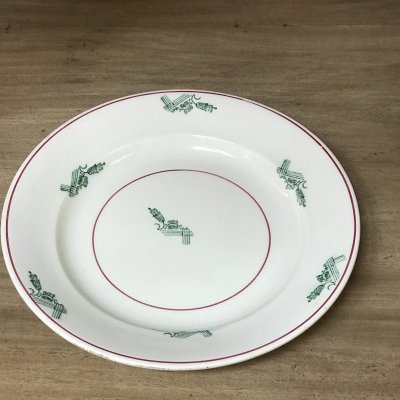 Round vintage platter with red lines and green design
