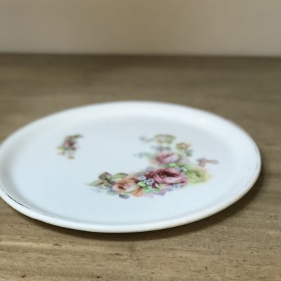 Round vintage platter with roses 