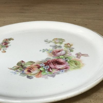 Round vintage platter with roses 