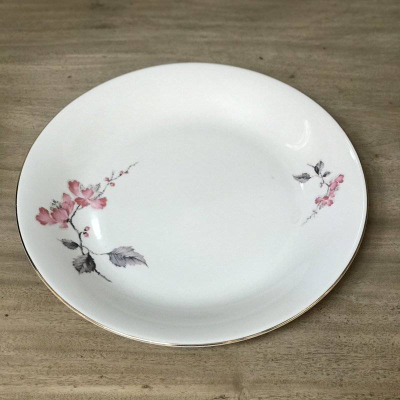 Round vintage platter with floral decorations