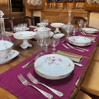 Vintage table set with pink flowers and gold edge