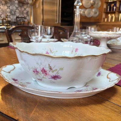 Vintage table set with pink flowers and gold edge