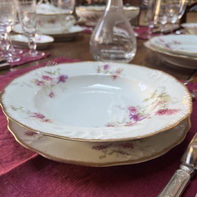 Vintage table set with pink flowers and gold edge