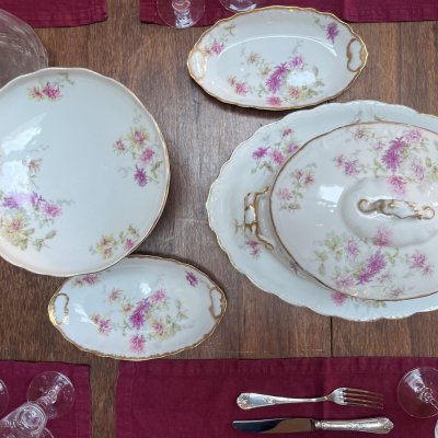 Vintage table set with pink flowers and gold edge