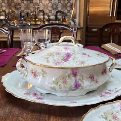 Vintage table set with pink flowers and gold edge