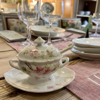 vintage table set decorated with peach flowers